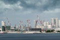 Crane and buildings in a construction site in Tokyo city Royalty Free Stock Photo