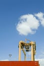 Crane And Cargo Container At Dock