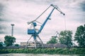 Crane in cargo port, analog filter Royalty Free Stock Photo