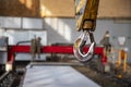 Crane clevis sling hook in an industrial factory. Royalty Free Stock Photo