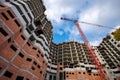 Crane construction bricks concrete building in city