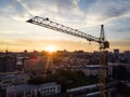 crane,construction cranes over building site silhouette with dramatic sky in the evening background,technology transportation Royalty Free Stock Photo