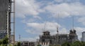 Crane and construction site building against blue sky modern architecture background many high-rise buildings under construction Royalty Free Stock Photo