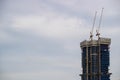 Crane and construction site building with twilight Royalty Free Stock Photo