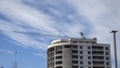 Crane and Construction Site. Building under construction. Tower Cranes on a Construction Site on a Blue Sky Background. A New Royalty Free Stock Photo