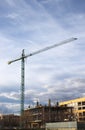 Crane of a construction site that is constructing a building Royalty Free Stock Photo