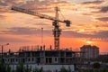 Crane and construction site at sunset Royalty Free Stock Photo