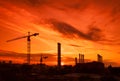 Crane in the construction site under the sunset Royalty Free Stock Photo