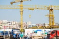 Crane and construction site working on building complex in Shenzhen China, infrastructure developing city concept