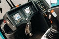 Crane control panel in the driver`s cab of a car crane