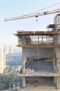 Crane and corner of high rise block Royalty Free Stock Photo