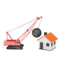 Crane destructing house