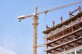 Crane during formworks. Housing renovation concept. View of a large construction site with buildings under construction Royalty Free Stock Photo