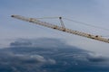 Crane girder over darl clouds Royalty Free Stock Photo