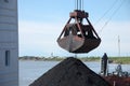 Crane grab with coal Royalty Free Stock Photo
