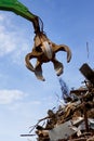 A crane grabber loading a metal Royalty Free Stock Photo