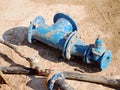 Crane handling 500mm pipe with gate valves. Construction process Royalty Free Stock Photo