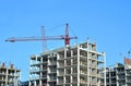 Crane and highrise construction site Royalty Free Stock Photo