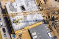 Crane and highrise construction site. aerial View Royalty Free Stock Photo