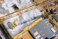 Crane and highrise construction site. aerial View Royalty Free Stock Photo