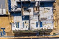 Crane and highrise construction site. aerial View Royalty Free Stock Photo