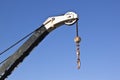 Crane hoist with blue sky background