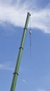 Crane hoist with blue sky background Royalty Free Stock Photo