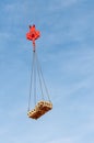 Crane hoist and hook, lifting container with four lengths of chain Royalty Free Stock Photo