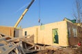 Crane Install SIP panels for Frame House Construction