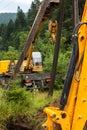 Crane installing utility poles Royalty Free Stock Photo