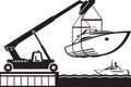 Crane launching yacht in water