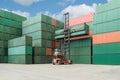 Crane lift up container box loading to cargo container depot Royalty Free Stock Photo