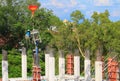 Crane lifting concrete mixer container and worker in construction building commercial in site workplace Royalty Free Stock Photo