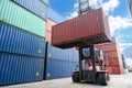 Crane lifting handling up with container box at dockyard, Container loading cargo freight in import and export business logistic Royalty Free Stock Photo