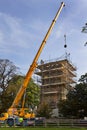 Crane Lifting Masonary - Church Roof Restoration Royalty Free Stock Photo