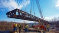 Crane Lifting a Steel Bridge Section During Construction Royalty Free Stock Photo