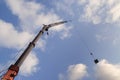 Crane Lifting a Steel Panel