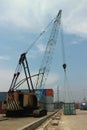 crane lifting up container at harbor Royalty Free Stock Photo