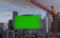 Crane lifts the billboard. city landscape Royalty Free Stock Photo