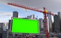 Crane lifts the billboard. city landscape