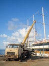 Crane for loading and lifting boats. Transportation of boats. Private boats. Resort place