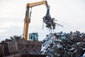 Crane-loading scrap in a train