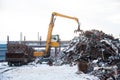 Crane-loading scrap in a train