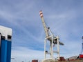 Crane for loading and unloading container ships is in the port Royalty Free Stock Photo