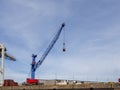 Crane for loading and unloading container ships is in the port Royalty Free Stock Photo