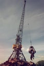 Crane with a metal claw Royalty Free Stock Photo