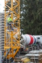 Neuwied, Germany - February 1, 2019: a crane operator is actuating his crane with a remote control