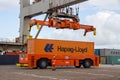 Crane operator shipping sea container