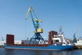 Crane and Ship in the port of the Hanseatic city of Wismar in Germany