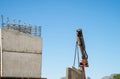 Crane removing concrete encasement